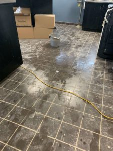 Concrete Tile Floor Before Janitorial Services - Canadian Carpet Cleaning