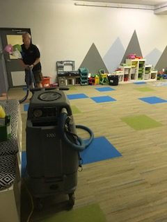 Canadian Carpet Cleaning Commercial room with carpet