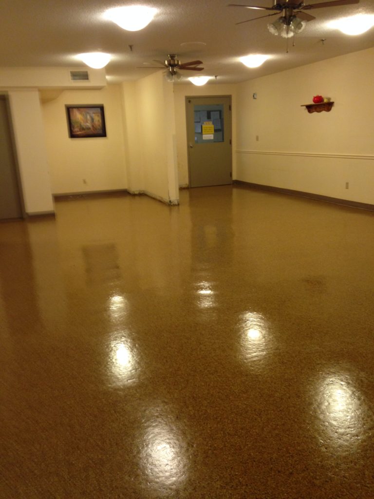 Floor waxing services by Canadian Carpet Cleaning
