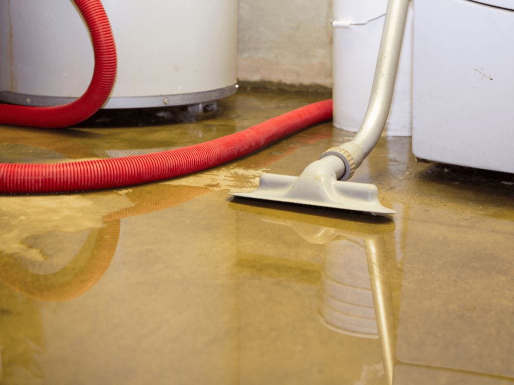 Water damage being cleaned with emergency cleaning services