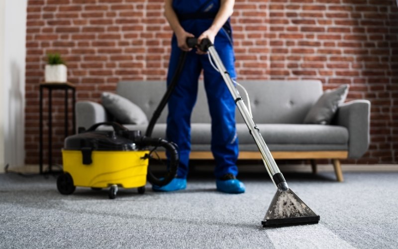 Canadian Carpet Cleaning team cleaning an office space.
